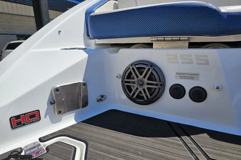 Slide: The Image of 2022 Scarab 255 Wake ID boat rear view with speaker and high output badge. - 35