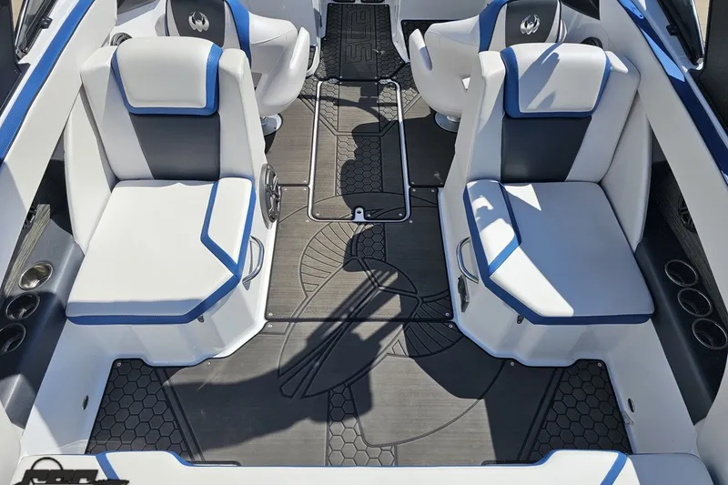 Slide: The Image of Interior of 2022 Scarab 255 Wake ID boat with stylish seating and modern design. - 42