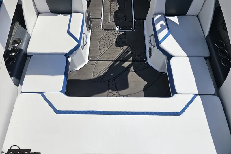 Slide: The Image of Interior seating of 2022 Scarab 255 Wake ID boat with white and blue upholstery. - 41