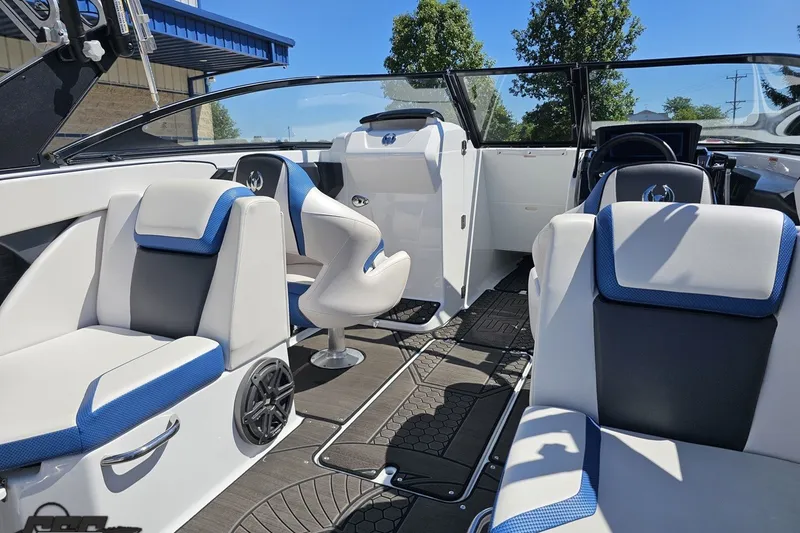Slide: The Image of 2022 Scarab 255 Wake ID boat interior with modern seating and sleek design. - 57