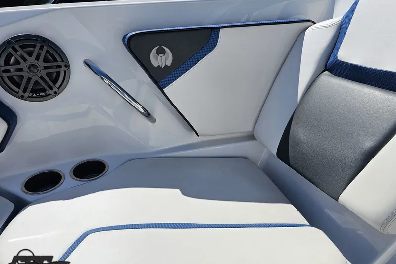 Slide: The Image of Interior of 2022 Scarab 255 Wake ID boat with speaker and stylish seating. - 98
