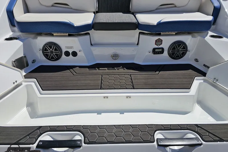 Slide: The Image of 2022 Scarab 255 Wake ID boat interior with seating and audio system. - 37