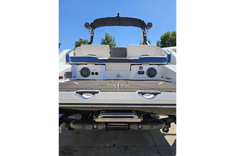 Slide: The Image of 2022 Scarab 255 Wake ID boat rear view with seating and speakers. - 31