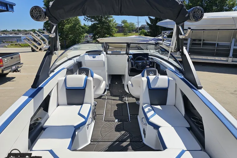 Slide: The Image of 2022 Scarab 255 Wake ID boat interior with sleek seating and modern dashboard. - 40
