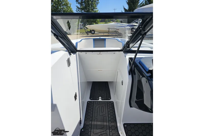 Slide: The Image of Interior view of 2022 Scarab 255 Wake ID boat, showcasing sleek design and modern features. - 80