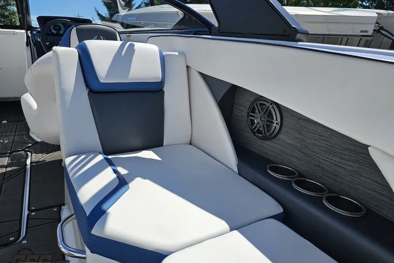Slide: The Image of Interior of 2022 Scarab 255 Wake ID boat with stylish seating and speaker system. - 46