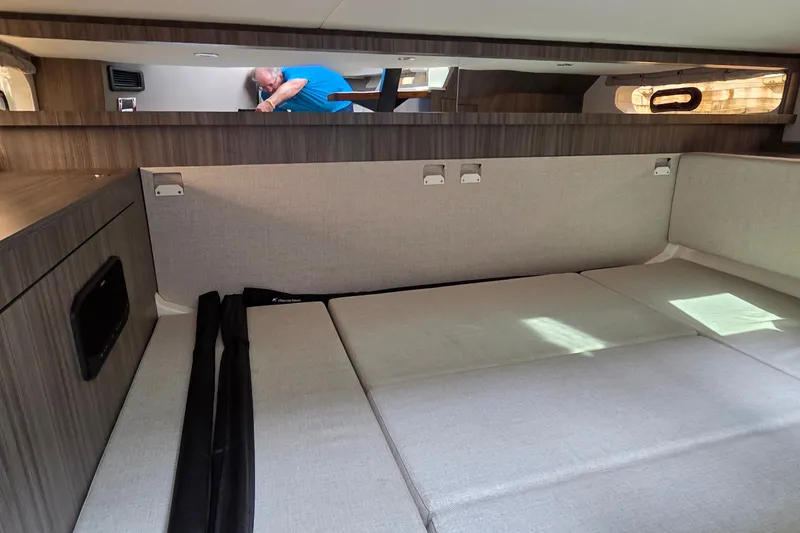 Slide: The Image of Interior cabin of 2023 Sea Ray Sundancer 370 Outboard with modern furnishings. - 25
