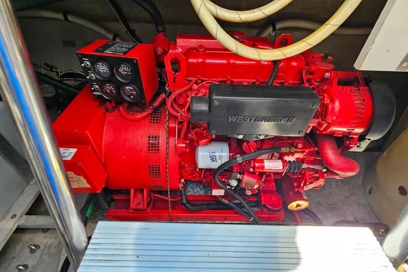 Slide: The Image of Red Westerbeke engine in a 1995 Sea Ray 500 Sundancer yacht. - 45
