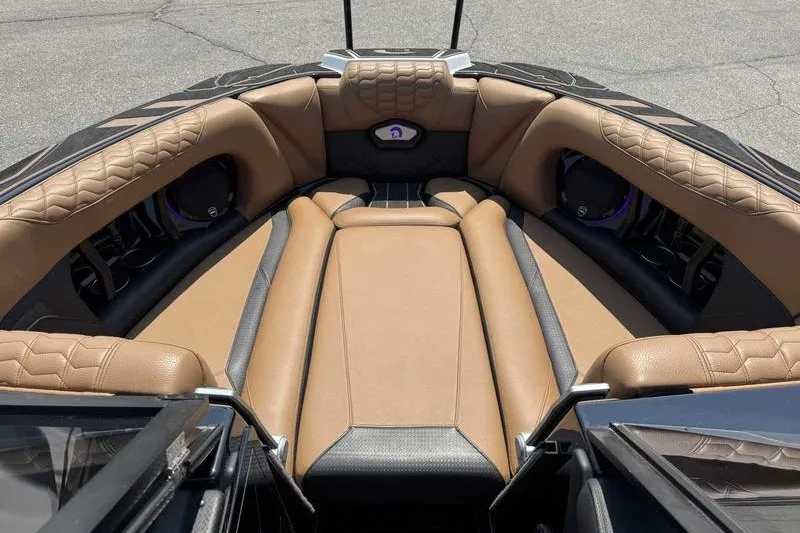 Slide: The Image of Luxurious interior of 2025 Centurion Ri245 boat with tan leather seating. - 7