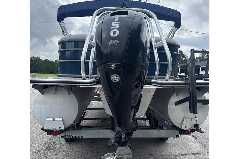 Slide: The Image of 2023 Bentley Pontoons Legacy Navigator 223 with powerful outboard motor. - 9