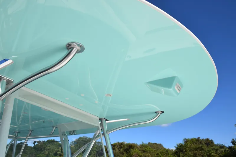 Slide: The Image of 2022 SeaVee 390Z boat with sleek turquoise canopy and stainless steel supports. - 27