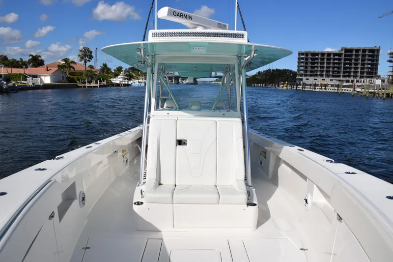 Slide: The Image of 2022 SeaVee 390Z boat on water, featuring spacious deck and modern design. - 6