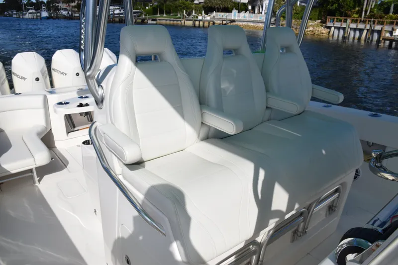 Slide: The Image of 2022 SeaVee 390Z boat with luxurious white seating and Mercury engines. - 19