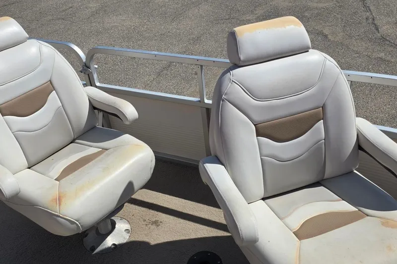 Slide: The Image of Two worn seats on a 2003 Northwood 2223 TRADITIONS boat. - 9