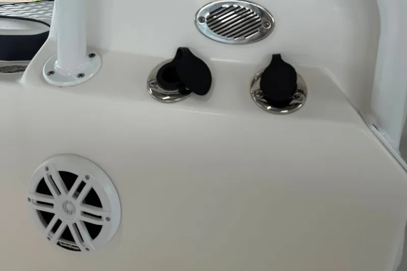 Slide: The Image of 2025 Clearwater 21 Bay boat console with speaker and control panel. - 7