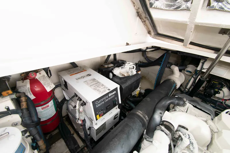 Slide: The Image of Engine room of 2009 Sea Ray Sundancer 400 with Cummins Onan marine generator. - 22