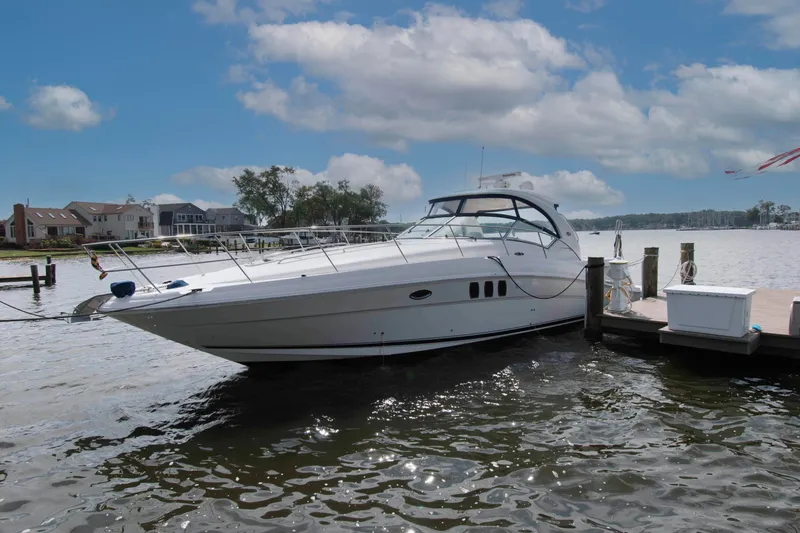 Slide: The Image of 2009 Sea Ray Sundancer 400 yacht docked on a sunny day with blue skies. - 1