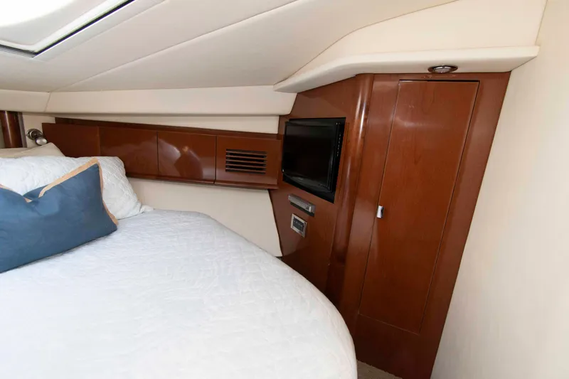 Slide: The Image of Interior cabin of 2009 Sea Ray Sundancer 400 yacht with bed and TV. - 15
