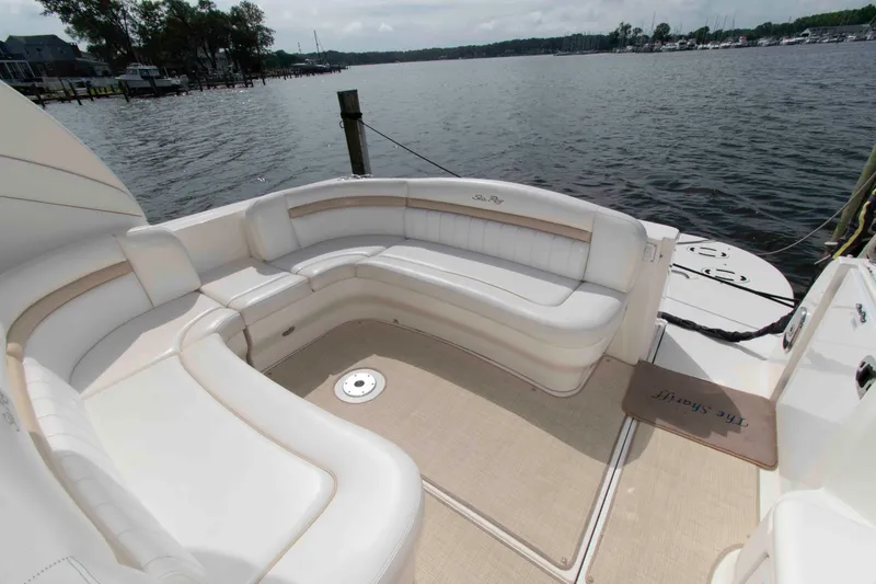Slide: The Image of Luxurious seating area on a 2009 Sea Ray Sundancer 400 yacht by the water. - 6