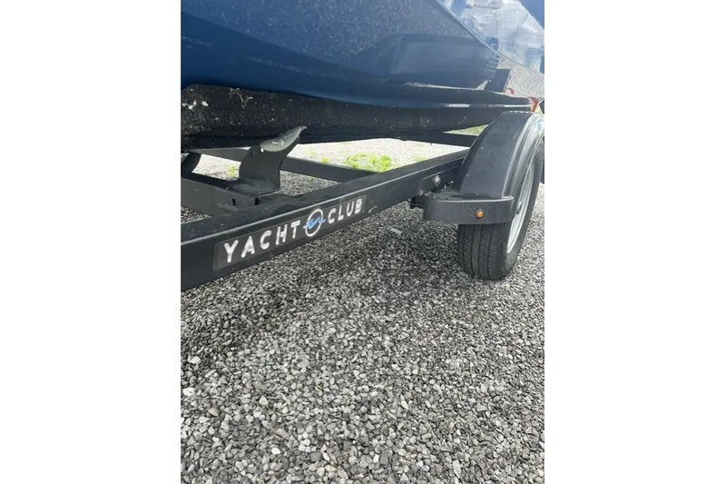 Slide: The Image of Trailer for 2024 Yamaha PWC FX Cruiser SVHO on gravel surface. - 14