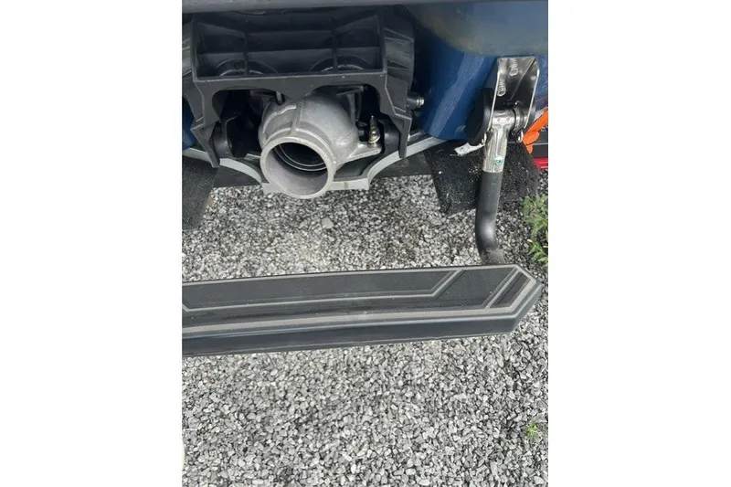 Slide: The Image of Rear view of 2024 Yamaha PWC FX Cruiser SVHO jet propulsion system on gravel. - 15