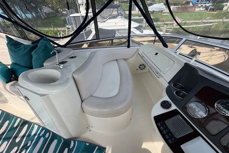 Slide: The Image of Interior of 2009 Meridian 391 Sedan yacht with seating and control panel. - 35
