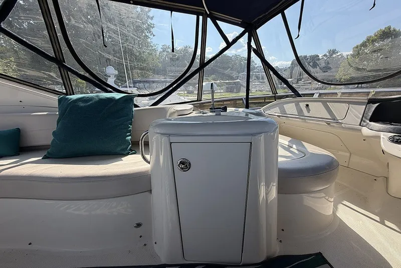 Slide: The Image of Interior of a 2009 Meridian 391 Sedan yacht with seating and a sink. - 36
