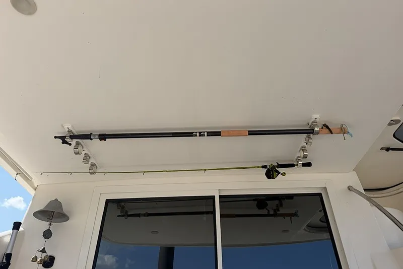 Slide: The Image of Fishing rods mounted on a 2009 Meridian 391 Sedan boat ceiling. - 8