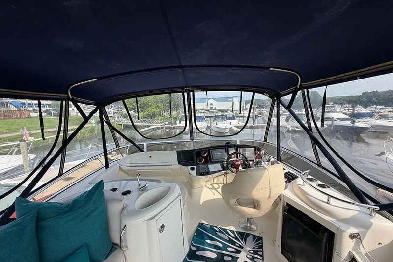 Slide: The Image of Interior view of 2009 Meridian 391 Sedan yacht with helm and seating area. - 26