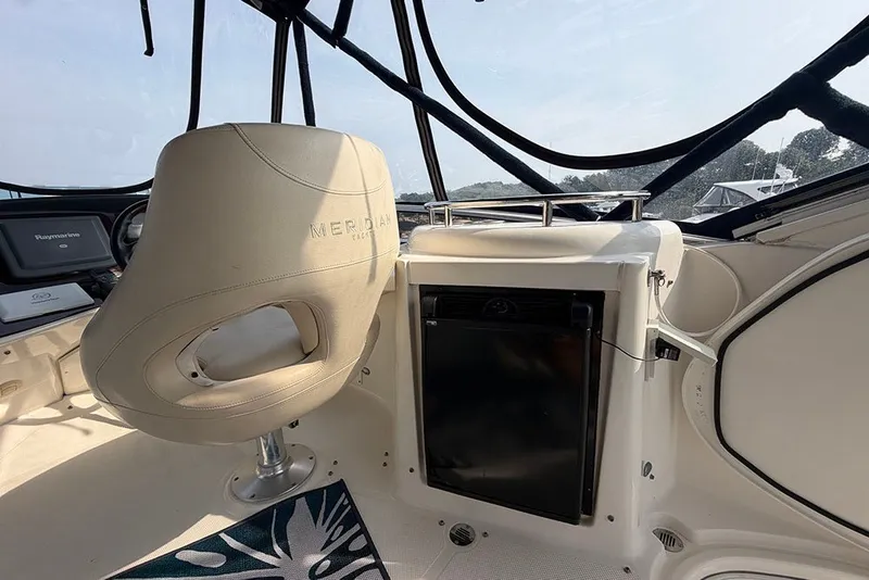 Slide: The Image of Interior of 2009 Meridian 391 Sedan yacht with captain's chair and navigation equipment. - 30