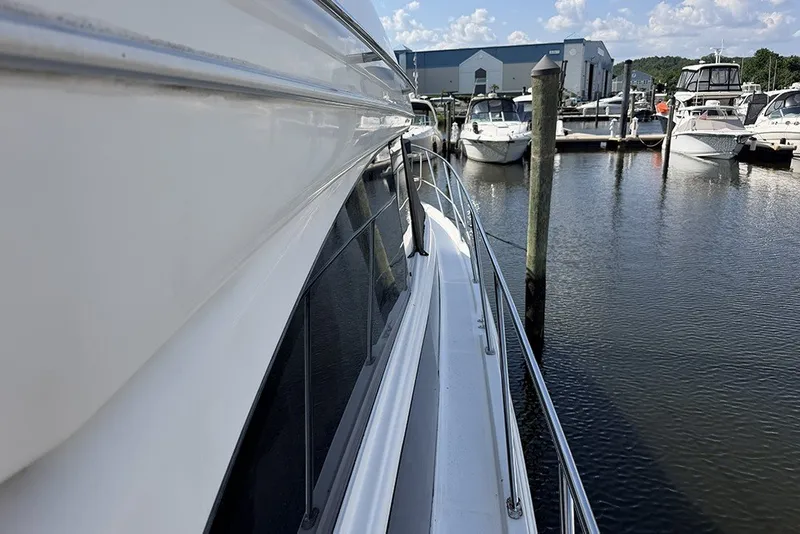 Slide: The Image of 2009 Meridian 391 Sedan yacht docked at a marina with other boats. - 39