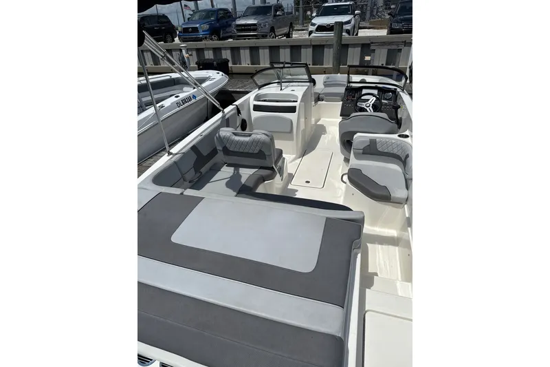 Slide: The Image of 2023 Bayliner VR6 Bowrider OB interior with spacious seating and modern design. - 4