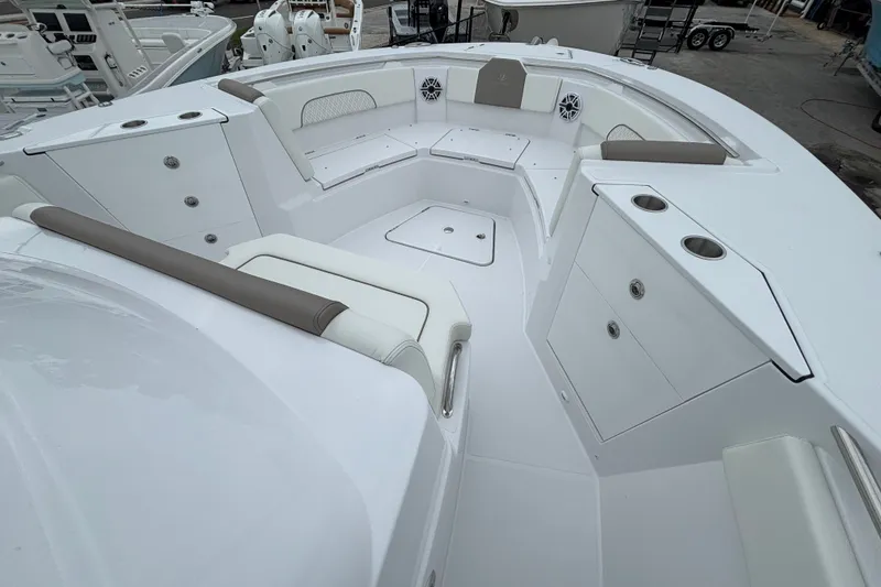 Slide: The Image of 2027 Bertram 34 CC boat interior with seating and storage compartments. - 10