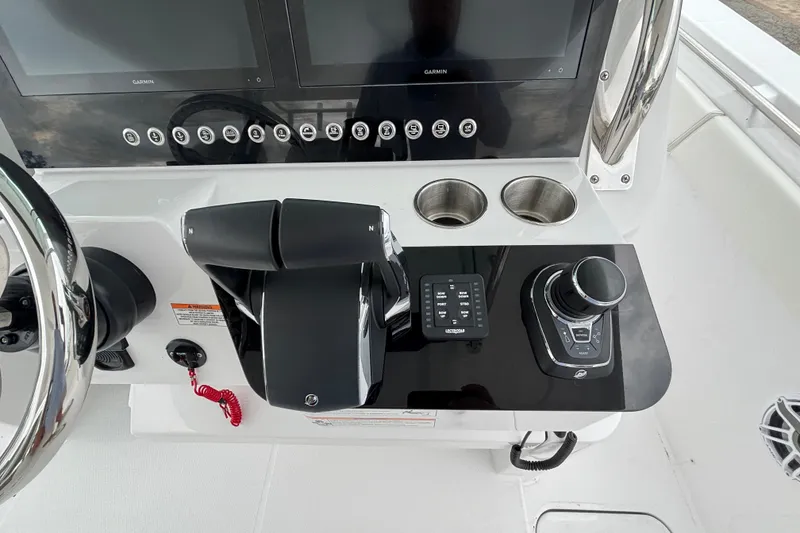 Slide: The Image of Control panel of 2027 Bertram 34 CC boat with modern navigation equipment. - 4