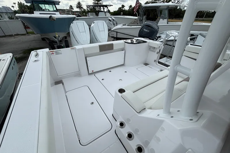 Slide: The Image of 2027 Bertram 34 CC boat interior with seating and storage compartments. - 21