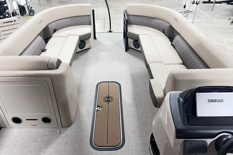 Slide: The Image of Luxurious interior of 2026 Harris Cruiser 250 pontoon boat with plush seating. - 12