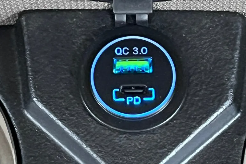 Slide: The Image of USB charging port with QC 3.0 and PD features on 2026 Harris Cruiser 250. - 32