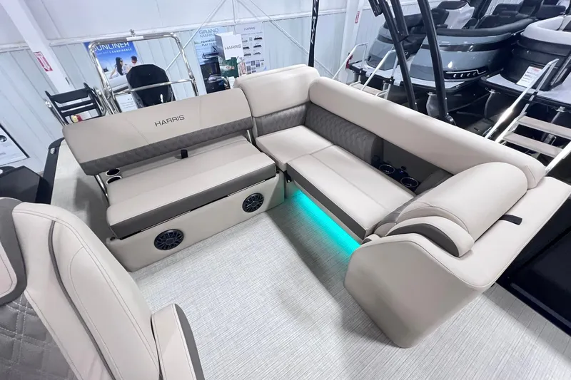 Slide: The Image of Luxurious seating on 2026 Harris Cruiser 250 pontoon boat with ambient lighting. - 24