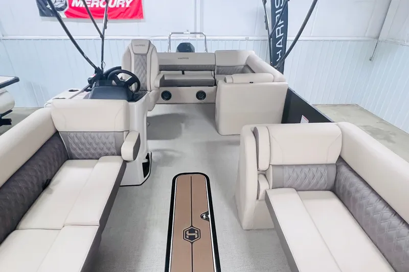 Slide: The Image of Interior of 2026 Harris Cruiser 250 pontoon boat with luxurious seating and modern design. - 6