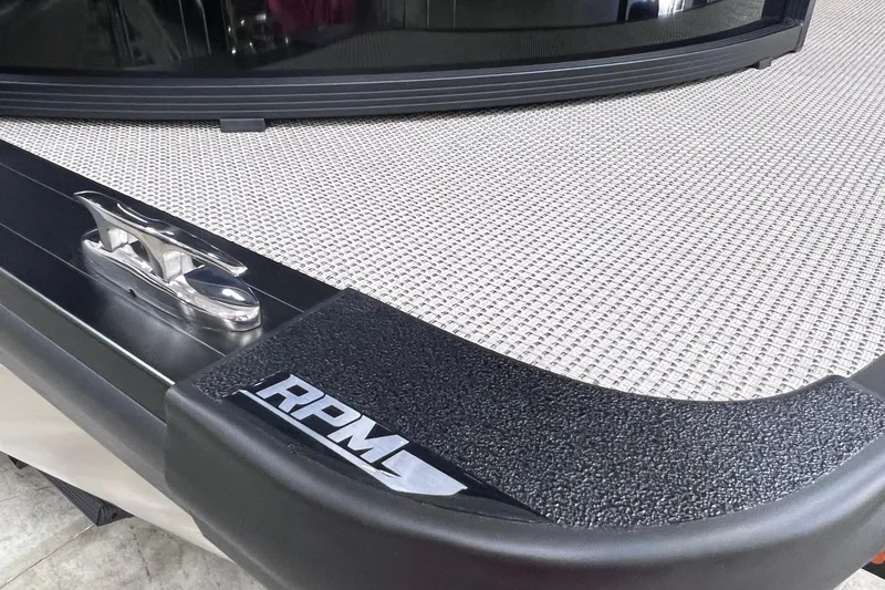 Slide: The Image of 2026 Harris Cruiser 250 boat deck with RPM logo and cleat detail. - 43