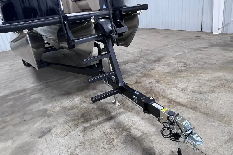 Slide: The Image of 2026 Harris Cruiser 250 pontoon boat trailer hitch and ladder on concrete floor. - 40
