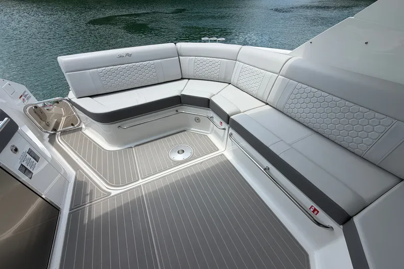 Slide: The Image of Luxurious seating area on 2025 Sea Ray Sundancer 320 yacht, featuring elegant design and comfortable upholstery. - 22