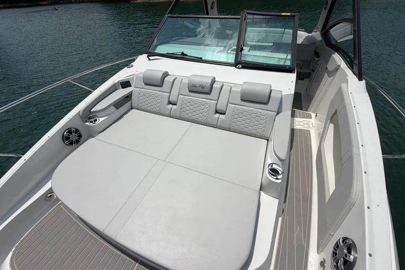 Slide: The Image of Luxurious 2025 Sea Ray Sundancer 320 boat interior with spacious seating and elegant design. - 28