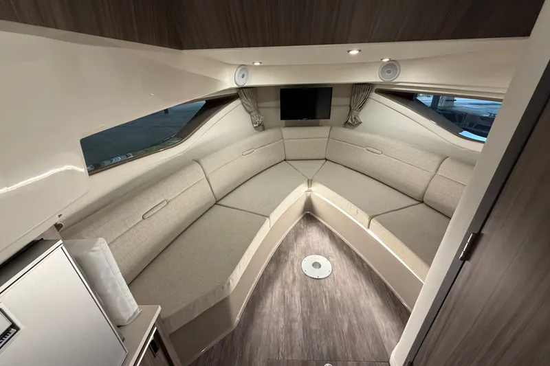 Slide: The Image of Luxurious interior of 2025 Sea Ray Sundancer 320 yacht with elegant seating and modern design. - 33