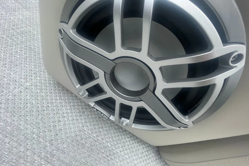 Slide: The Image of Close-up of a speaker in a 2023 Premier SOLARIS 230 RL PTX boat. - 8