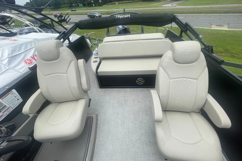 Slide: The Image of 2023 Premier SOLARIS 230 RL PTX boat interior with luxurious seating and modern design. - 9