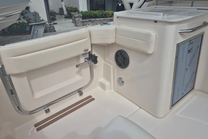 Slide: The Image of Interior view of 2027 Grady-White Freedom 285 boat, featuring seating and storage area. - 17
