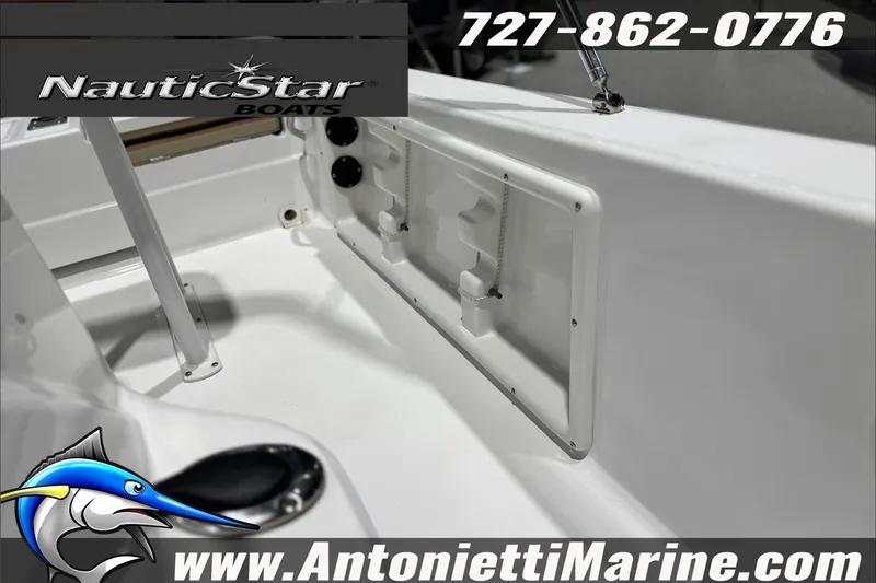 Slide: The Image of 2025 NauticStar 194 Bay boat interior with branding and contact details. - 15