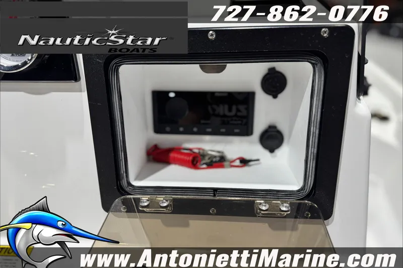 Slide: The Image of 2025 NauticStar 194 Bay boat console with storage compartment and marine electronics. - 20