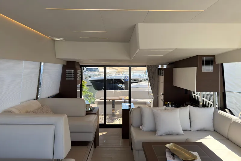 Slide: The Image of Luxurious interior of 2023 Prestige 520 yacht with modern furnishings and elegant design. - 20